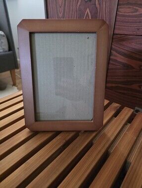 Lovely wooden tabletop picture frame.